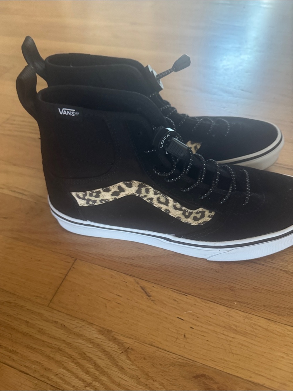 Vans Black High-Top Sneakers with Leopard Stripe